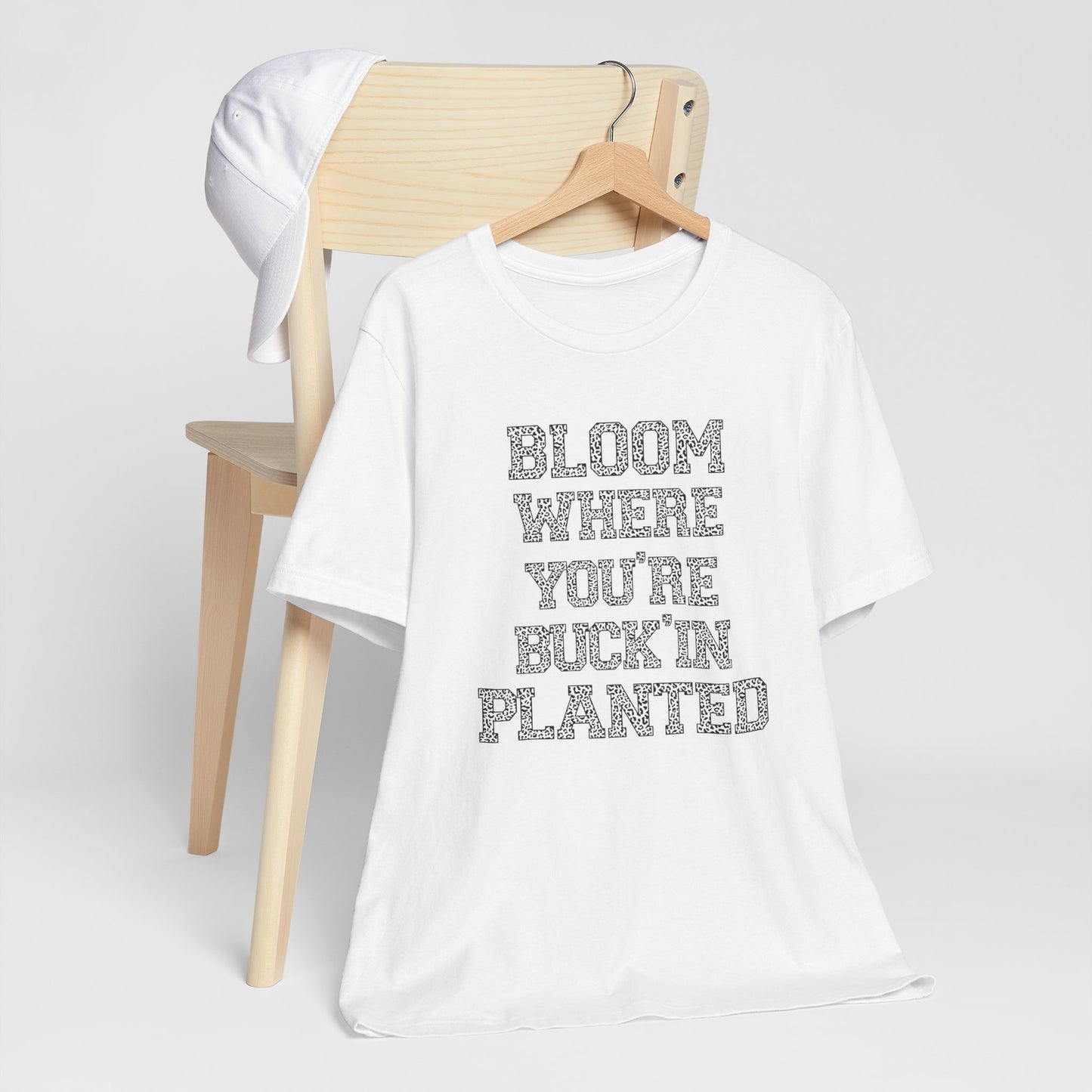 Inspirational "Bloom Where You're Buckin' Planted" Short Sleeve Tee - Unisex Garden Quote Shirt | Western Shirt | Country Girl Tee | Rustic Graphic Tee | Free Spirit Apparel | Outdoor Lifestyle Tee | Vintage Country Shirt | Softstyle Unisex Tee