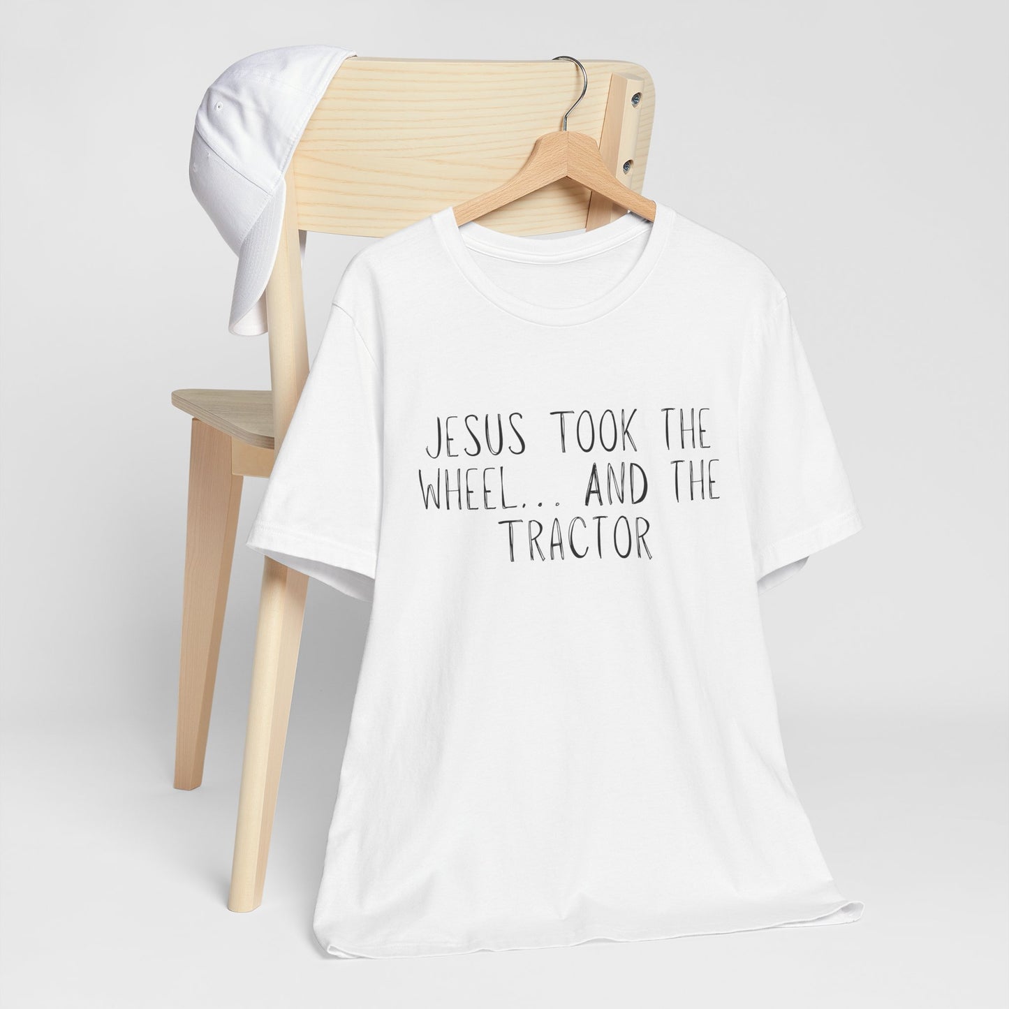 "Jesus Took the Wheel And The Tractor" Western Shirt | Country Girl Tee | Rustic Graphic Tee | Free Spirit Apparel | Outdoor Lifestyle Tee | Vintage Country Shirt | Softstyle Unisex Tee | Faith-Based Country Girl Tee | Rustic Christian Shirt
